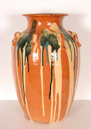 Billy Ray Hussey. Colorful Churn.: Shenandoah Valley Style Churn with Multi-colored Drips. "BH40" incised at base. 17" h. Excellent condition. Est. $500-800. Ship: $70