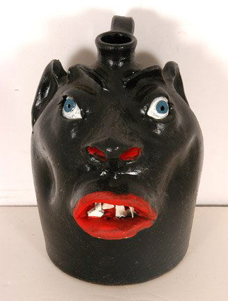 Robert Brown. Black Face Jug.: Signed. 8" h. Mint condition. Est. $100-200. Ship: $35