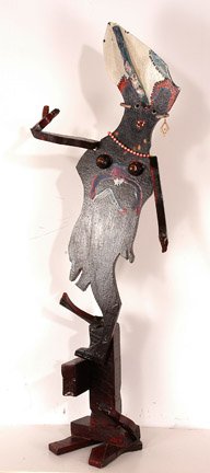 Derek Webster. Woman w Pearls.: Woodcarving with decorative costume jewelry. c. 1987. 46" x 16" x 12". Est. $400-600. Ship: $75. Rare works from the 1980's. Look closely and you will see faces everywhere. In 1989, Derek's work was i