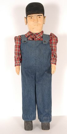 Geneva Gibson. Coal Minor.: Carved and painted wood with fabric clothing. Signed on bottom. 33.5" x 12". Est. $300-500. Ship: $7