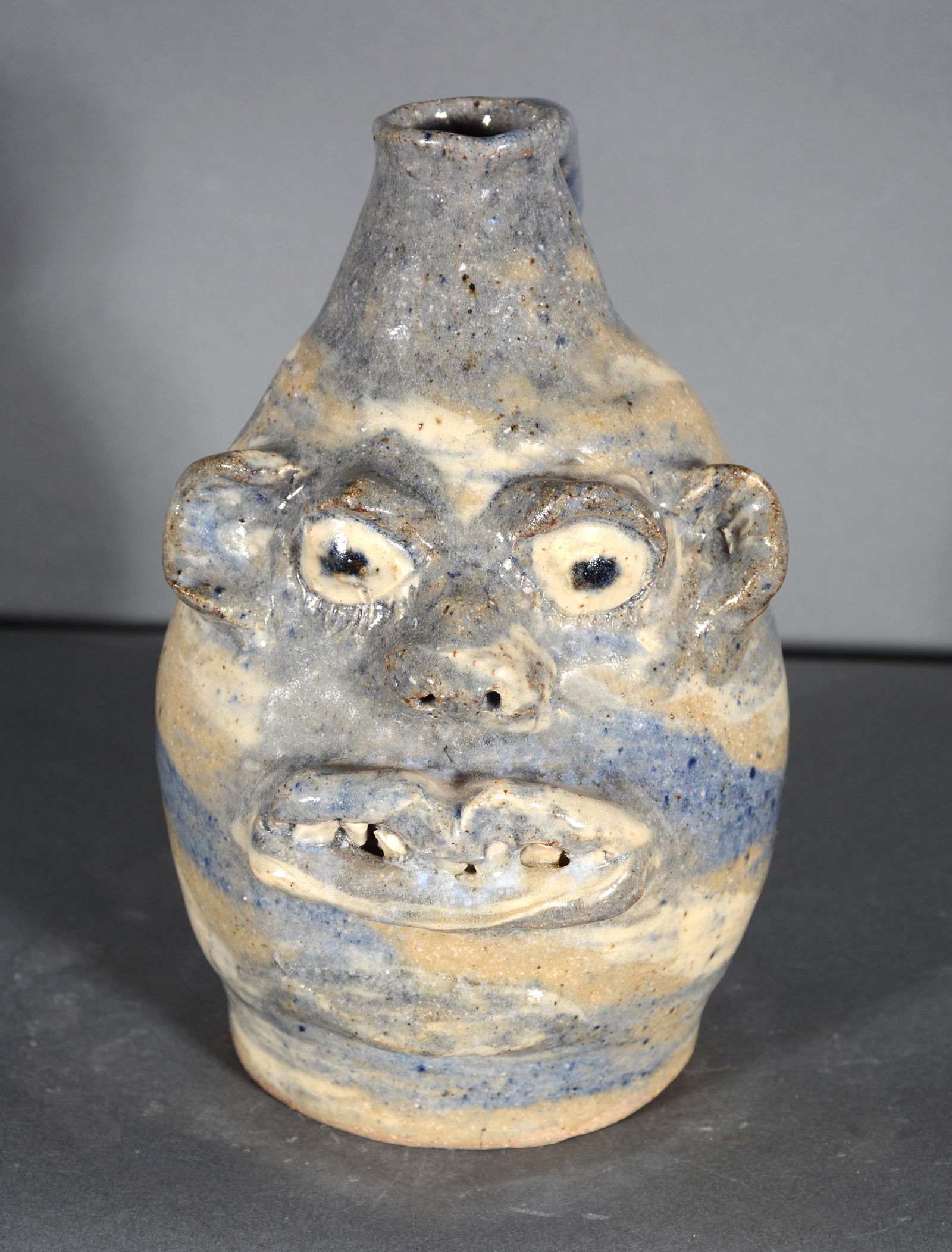 Marie Rogers. Pint Size 3 Color Swirl Face Jug. (1 of 3)