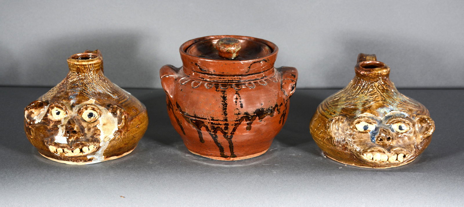 Marie Rogers. 2 Buggy Face Jugs & Bean Pot. (1 of 2)
