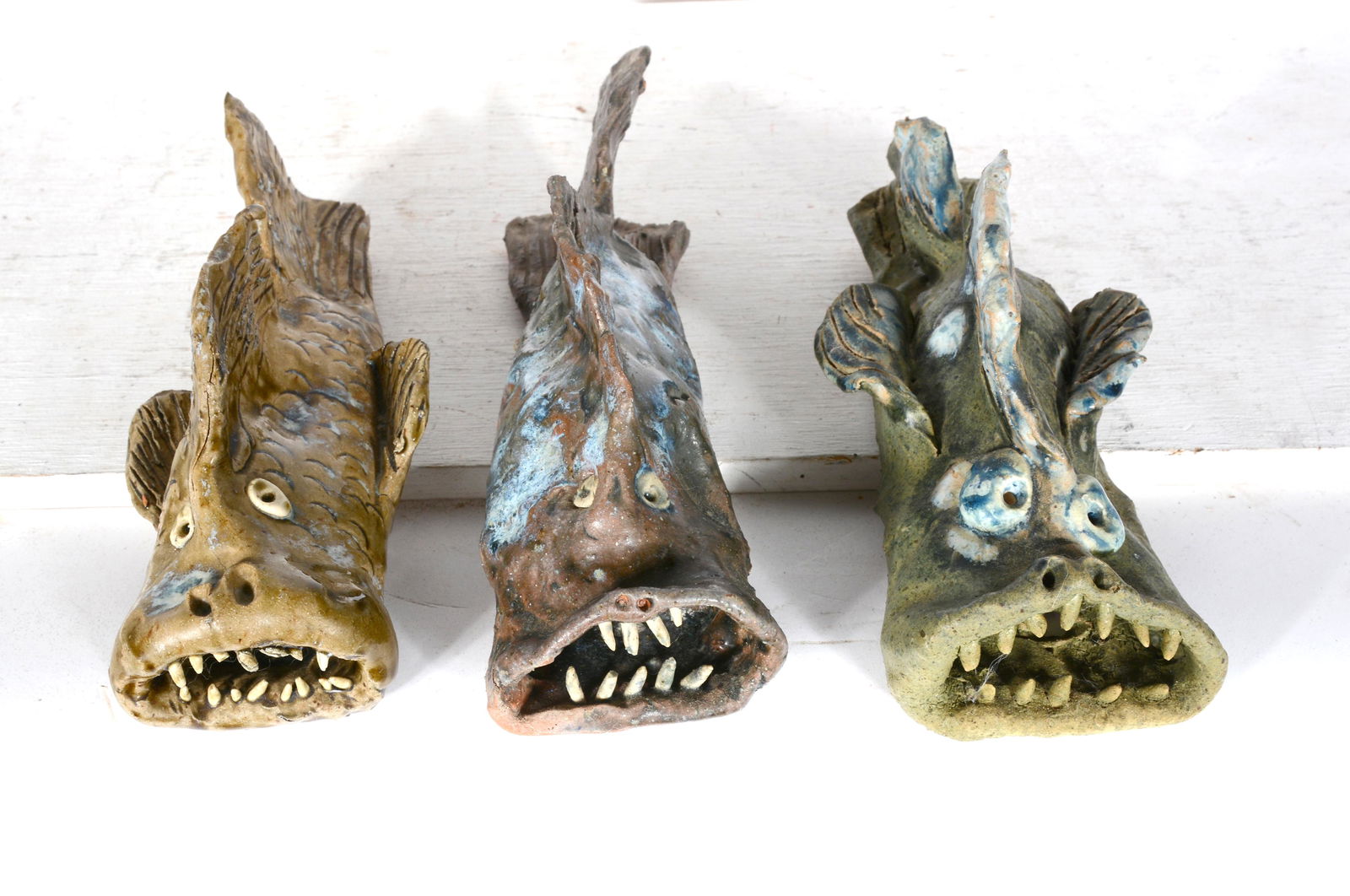 Joe Flowers. Three Pottery Catfish. (1 of 3)