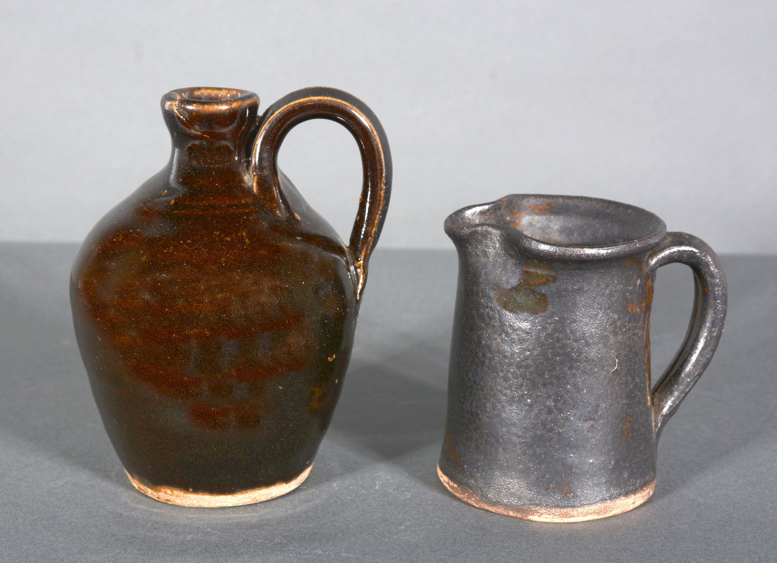 B.B. Craig. Mini Black Glazed Jug & Creamer. (1 of 3)