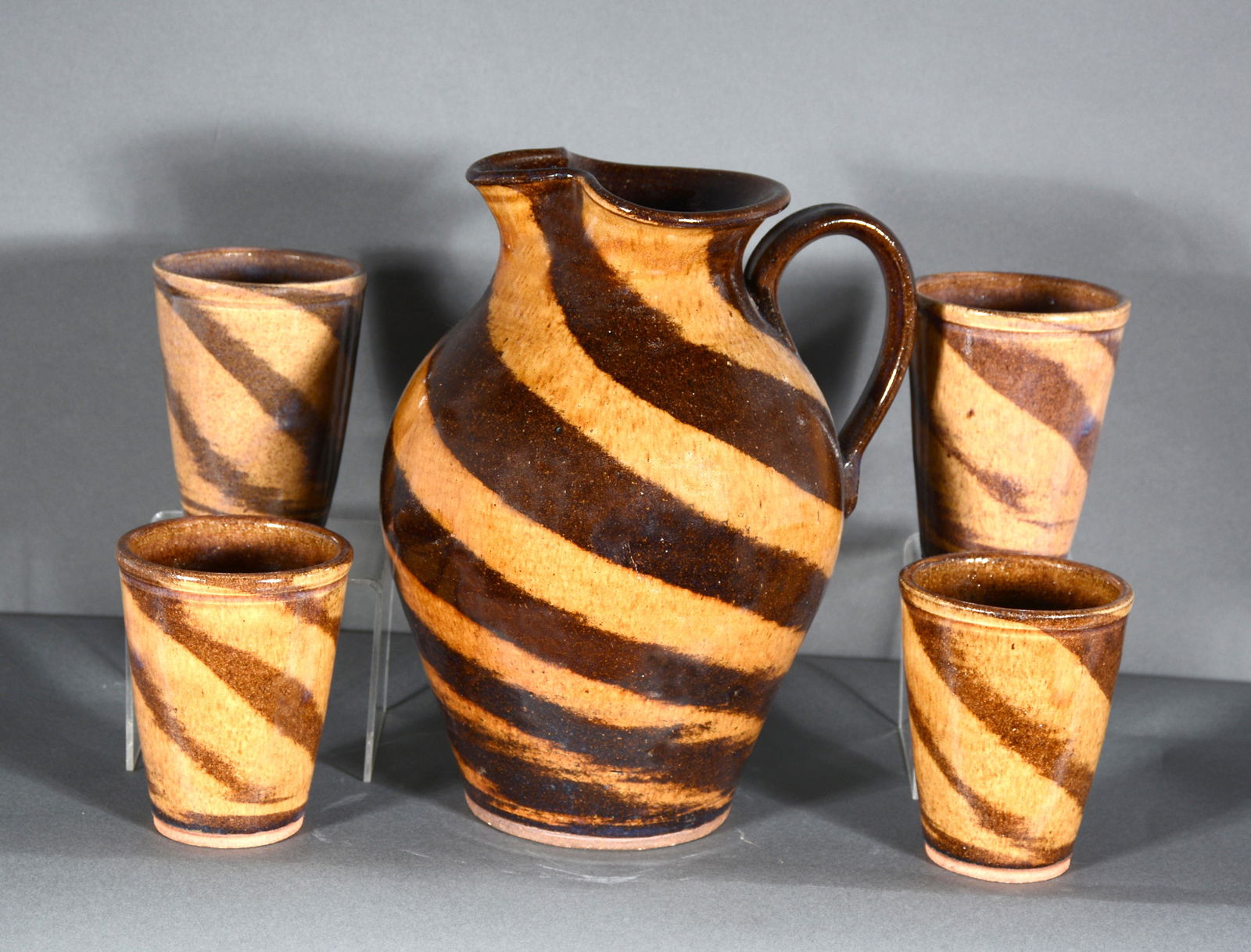 Kim Ellington. Pitcher With Four Cups. (1 of 3)