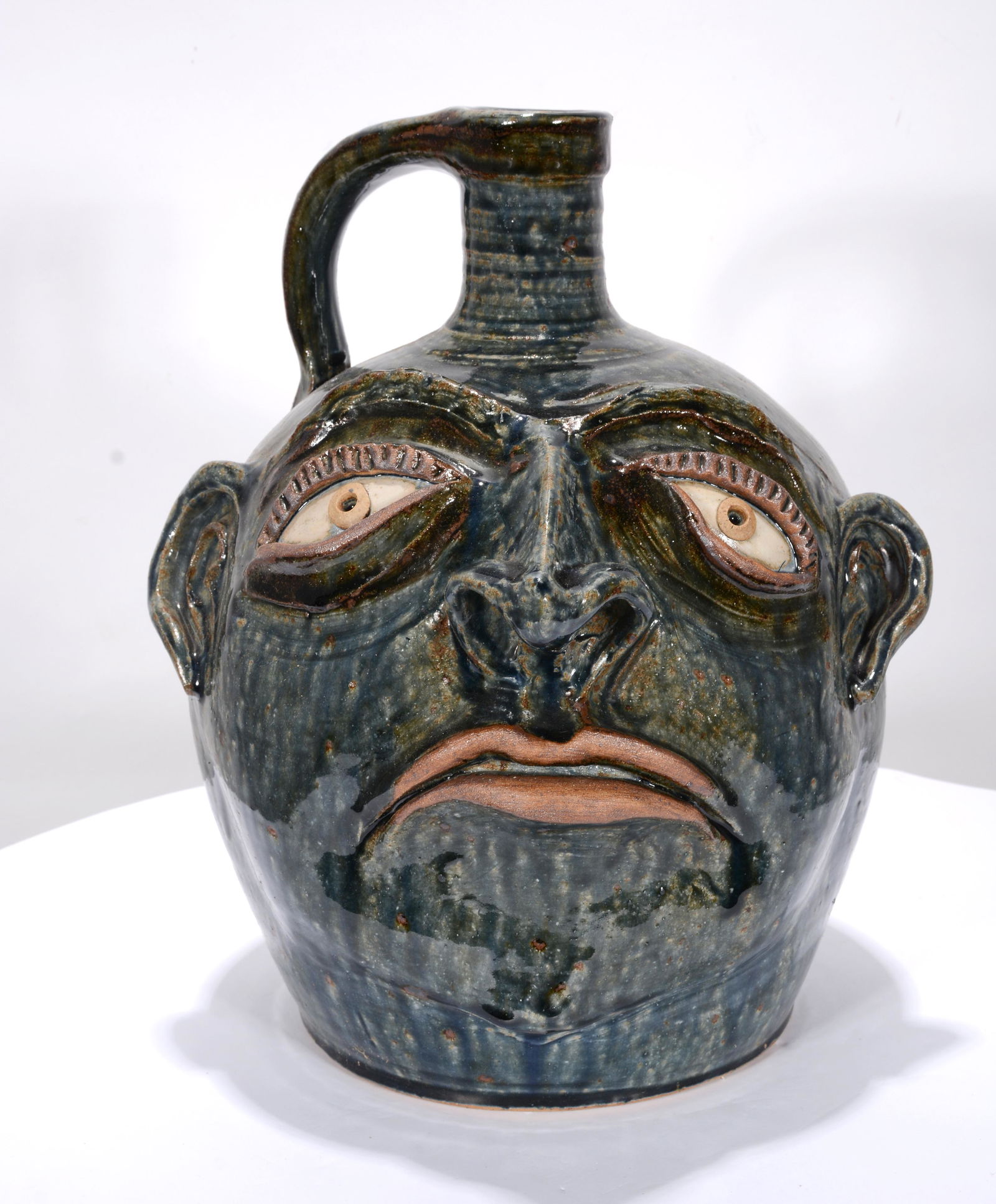 John Rezner. Lg Blue Glaze Face Jug. (1 of 3)