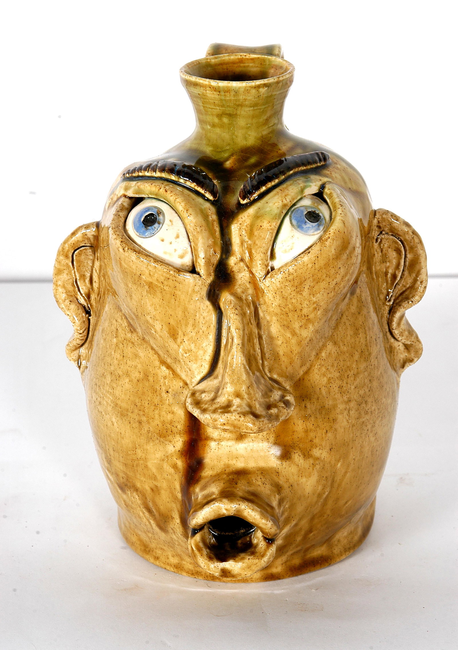 Joe Foster. Whistler Face Jug.: Joe Foster. Whistler Face Jug. Signed and titled. Mint condition. 9" h. Est. $100-200. Ship: $45
