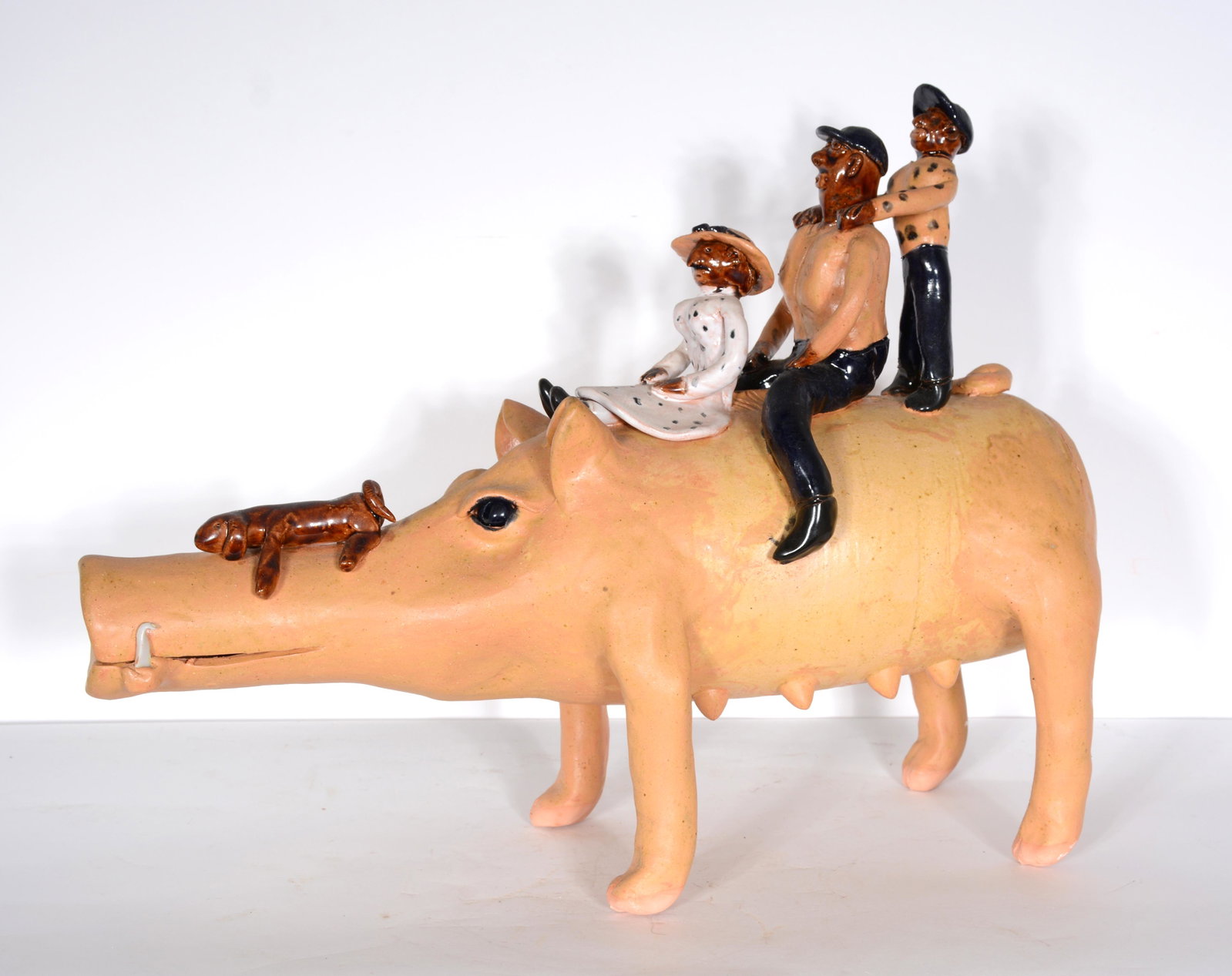 Claude Miller. Family Riding A Hog.: Claude Miller. Family Riding A Hog. 1998. Signed and dated. Excellent condition. 14" h x 18" long. Est. $200-400. Ship: $100