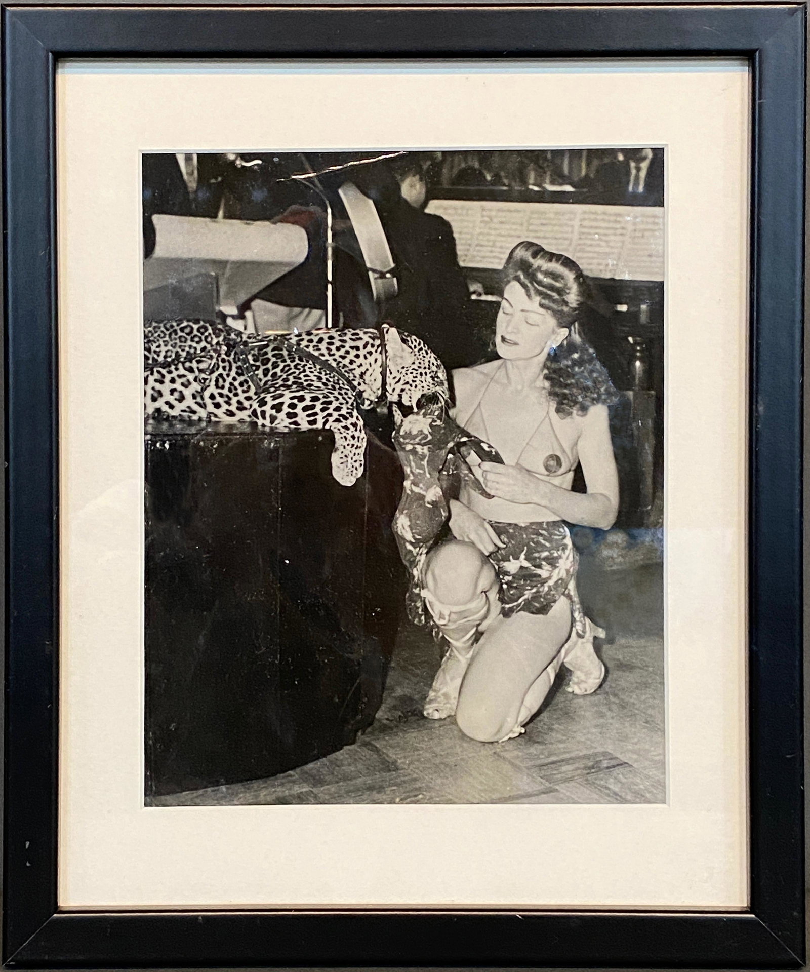 Female Circus Leopard Trainer Vernacular Photography.: Female Circus Leopard Trainer Vernacular Photography. c. 1940s. Black and white photograph. Minor ripple in photo, otherwise excellent condition. Size with frame is 10" w x 13.5" h. Est. $200-300. Shi
