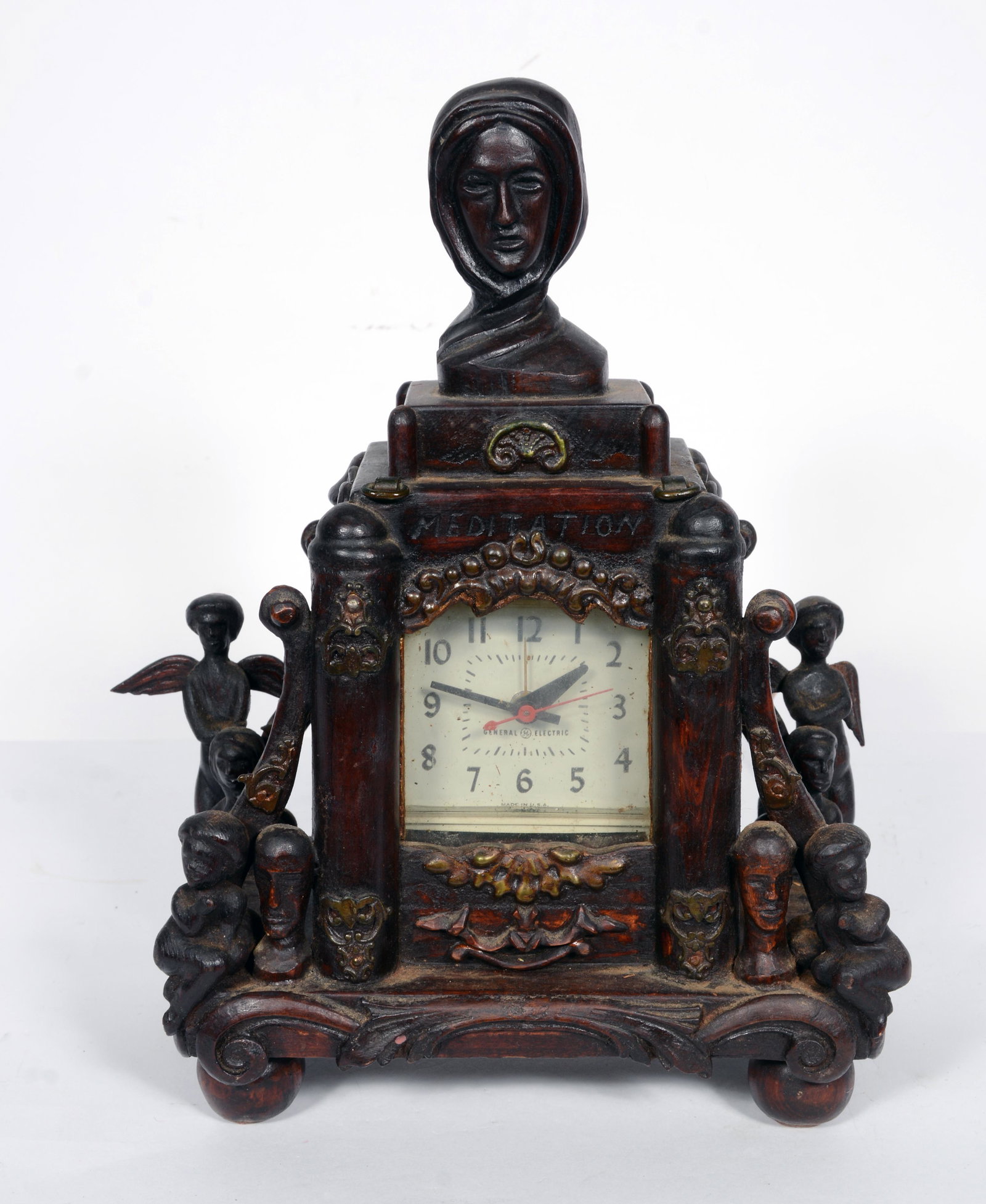 Rev. Joel D. Hewlett. Meditation Mantel Clock.: Rev. Joel D. Hewlett. Meditation Mantel Clock. Signed. Well-carved and stained wood with painted mini portraits. Carved Angels with wings, Cherubs, Mens' busts and decoration around clock face and por