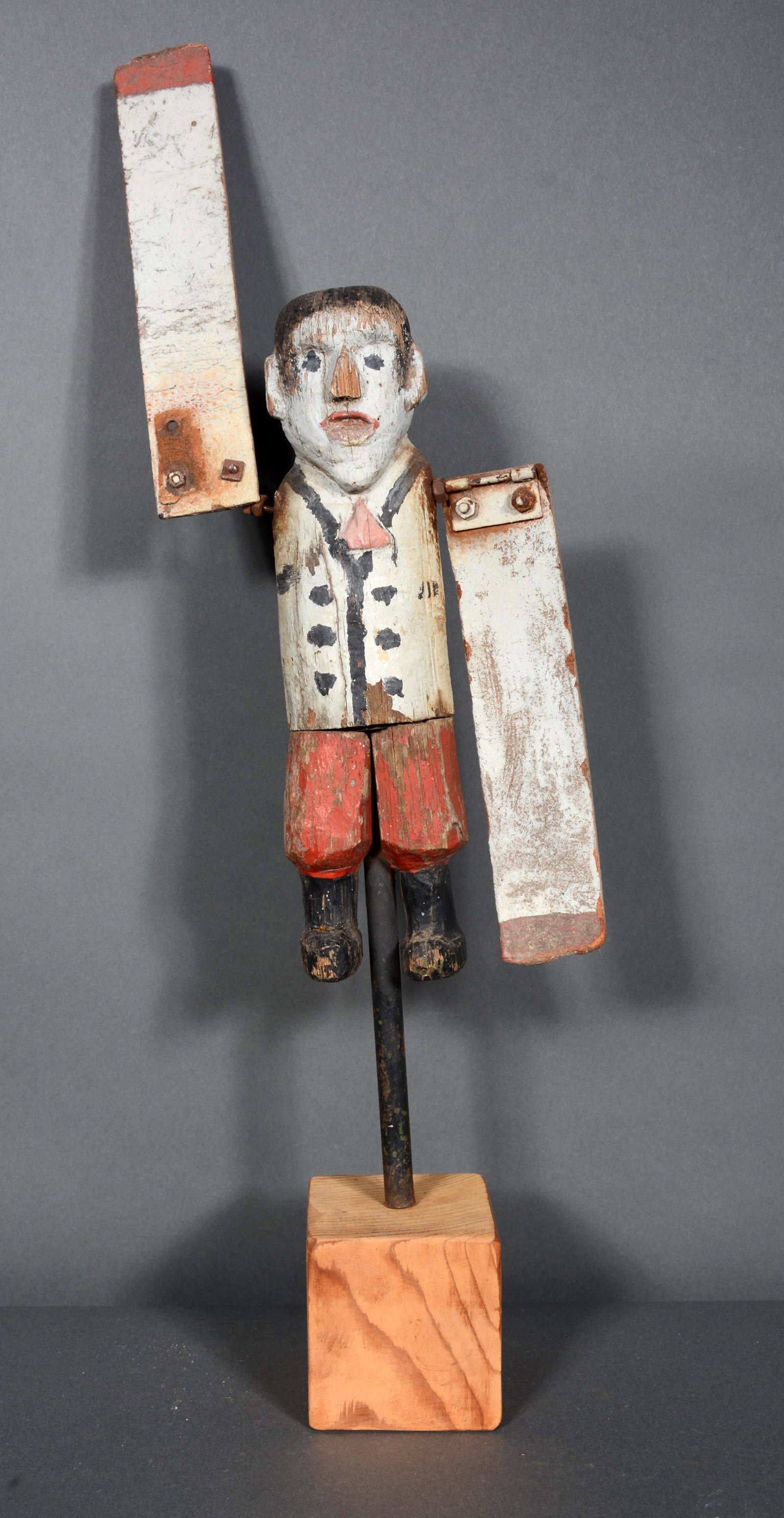 Early Whirligig Boy in Suit.: Anonymous Early Whirligig Boy in Suit. c. 1920s-40s. Carved and painted wood with fiber board arms and mixed media. Loss to nose, expected weathering and wear on paint, otherwise good to great environ