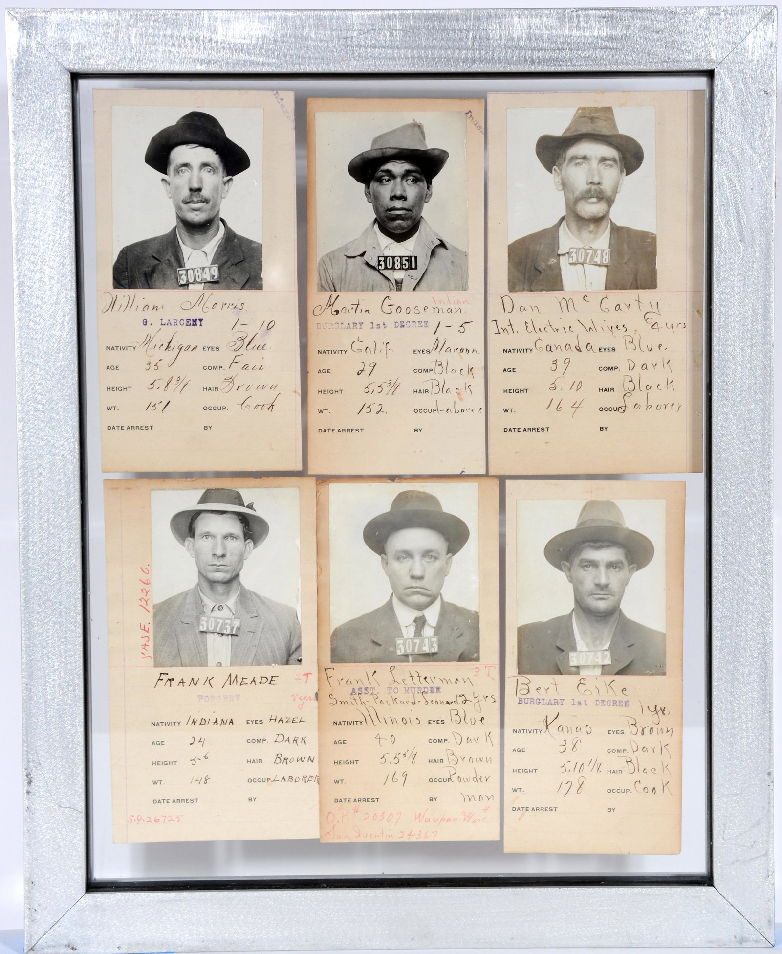 Six Double-Sided Prison Mug Shots.: Six Double-Sided Prison Mug Shots. c. 1920s. Mug shots from various prisons with descriptions below images. Silver print mounted on paper. Each image is 6.5" h x 3" w. Framed together, 15.5" w x 12" h