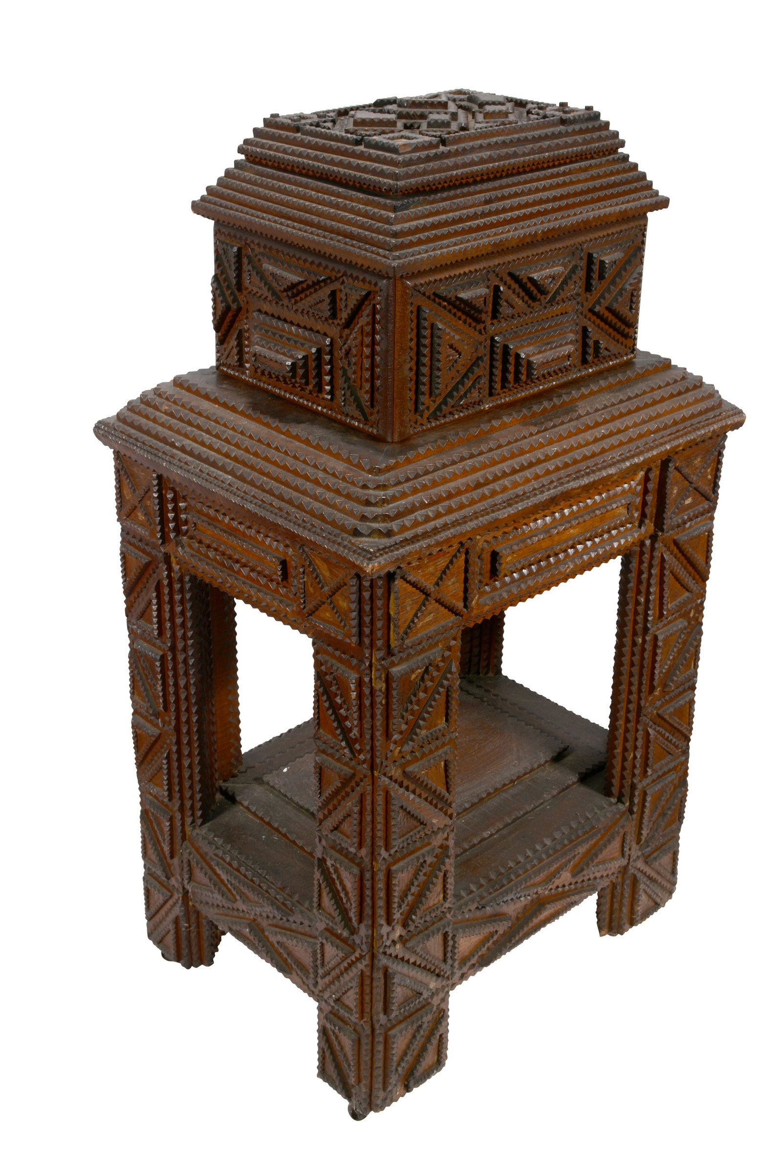 Large Tramp Art Table and Chest.: Large Tramp Art Table and Chest. Intricately carved and stained wood with four drawers and removeable lid. Minor loss on top, otherwise great condition. 49" h x 27" w x 21" d. Est. $2,000-3,000. Buyer