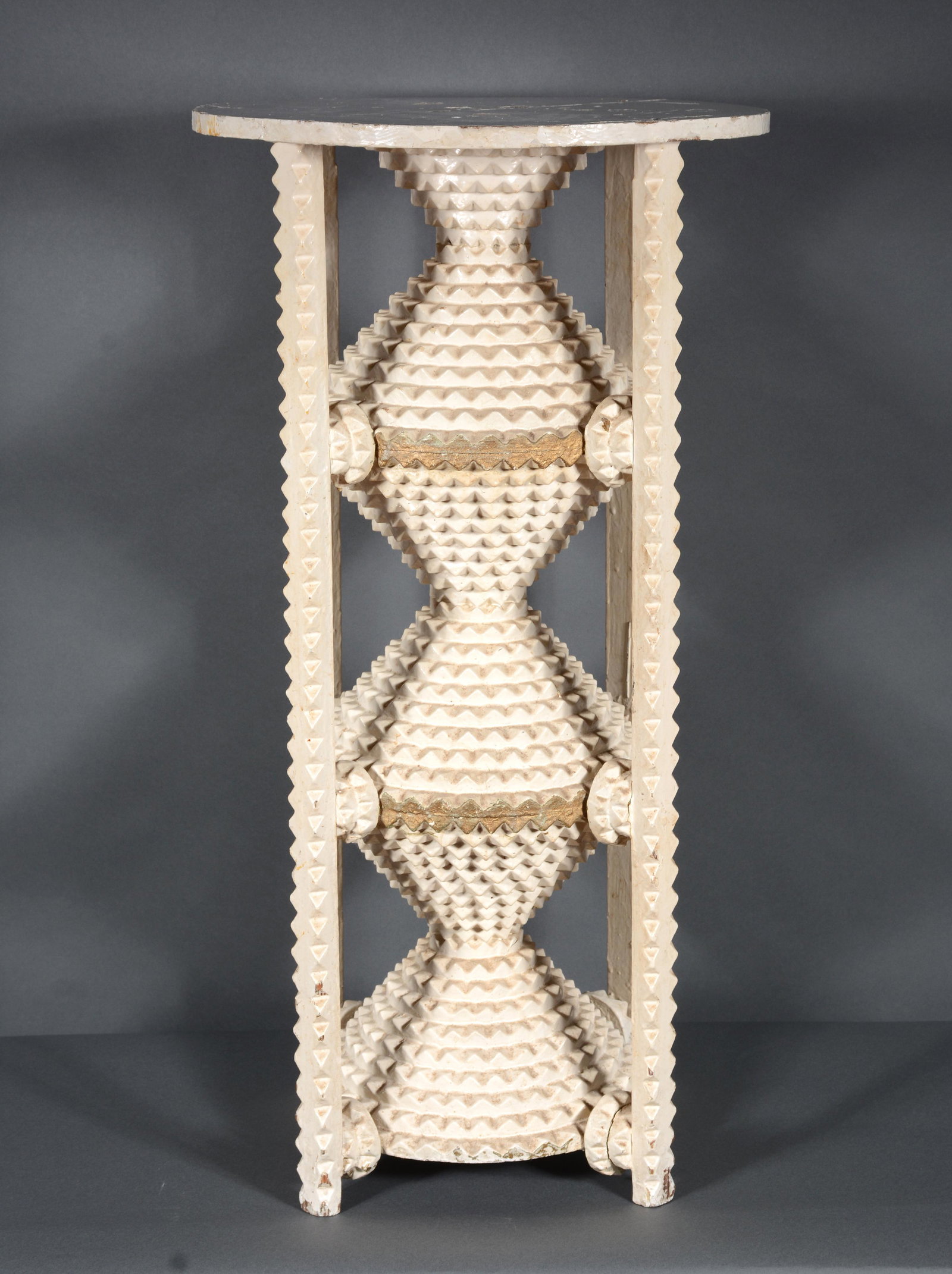 Three Tiered Circular Tramp Art Pyramid Plant Stand.: Three Tiered Circular Tramp Art Pyramid Plant Stand. Heavily carved wood with layers of white and gold paint. Minor wear, otherwise great condition. 30.5" h x 16" diameter. Est. $1,000-2,000. Ship: $1