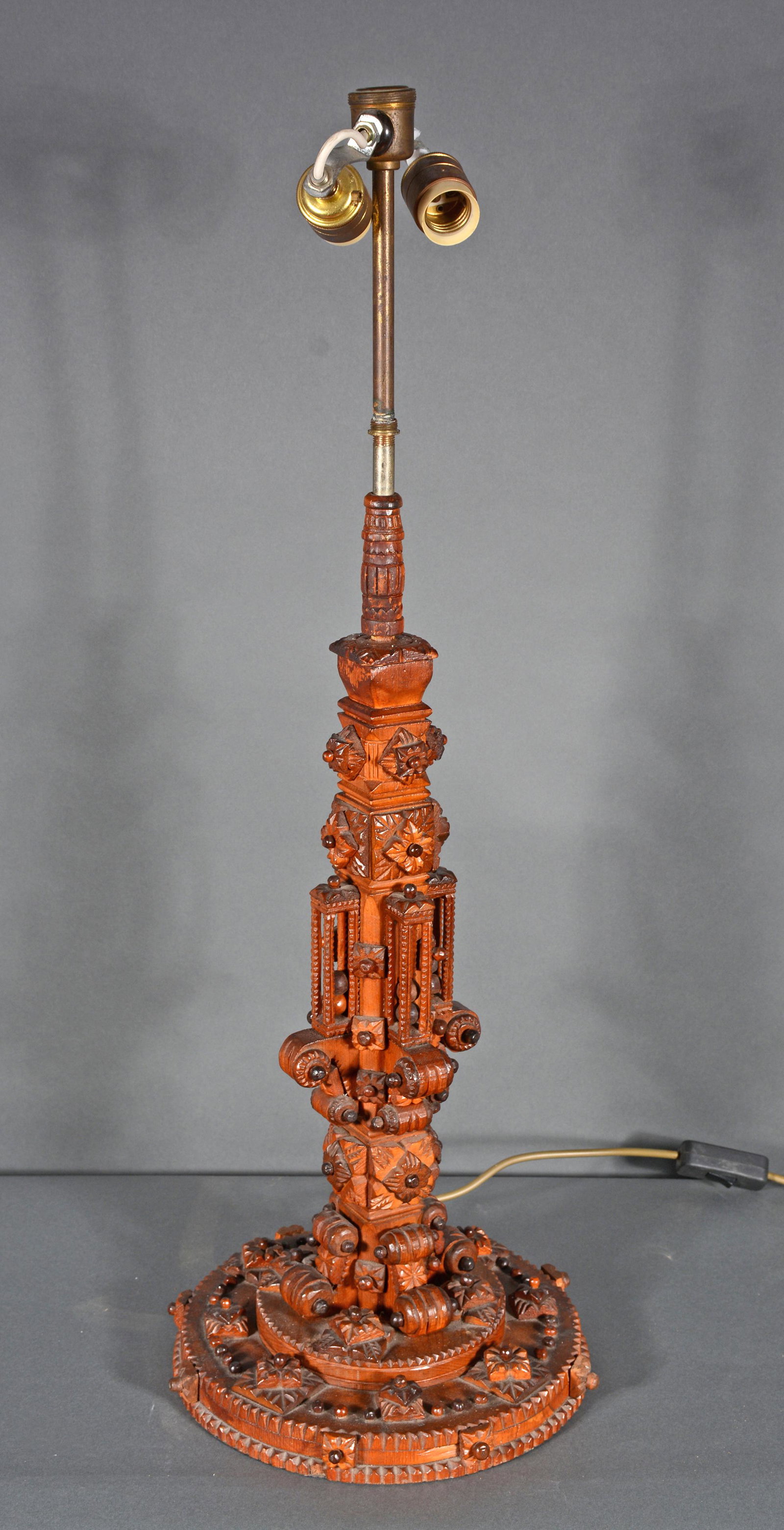 Victorian Tramp Art Lamp With Ball In Cage Decor.: Victorian Tramp Art Lamp With Ball In Cage Fanciful Decor. c. late 1800s. Carved and stained wood. Excellent condition. 32" h x 10.5" d. Est. $800-1,200. Ship: $85