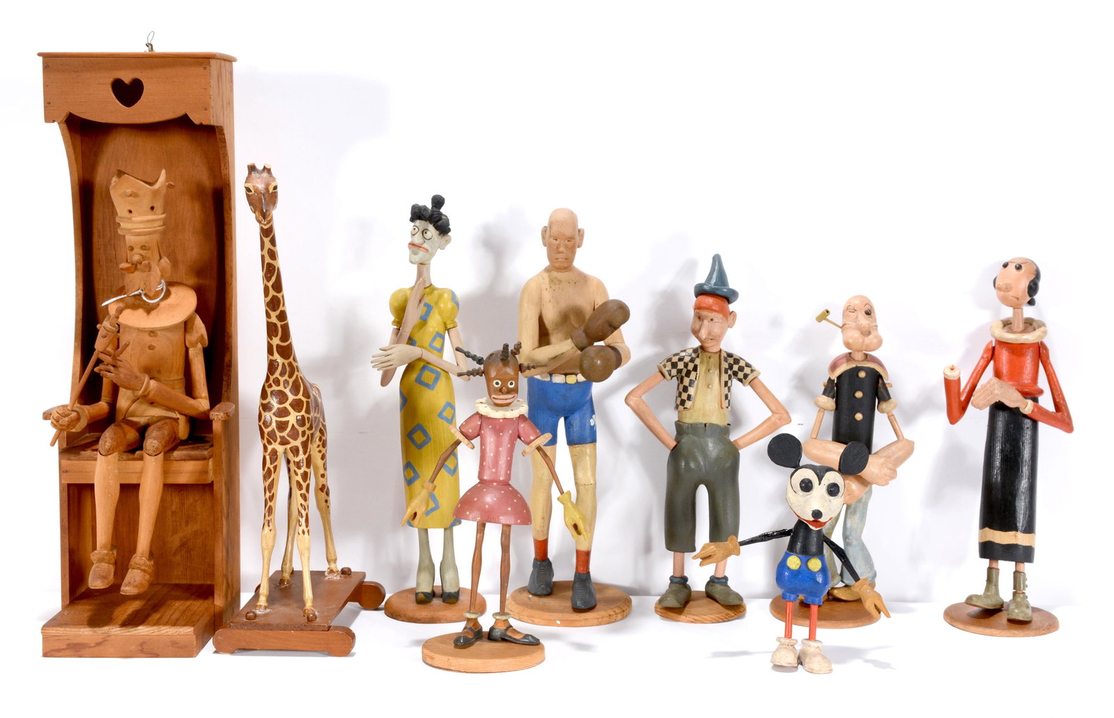 Walter Karl Ginther. Nine Carved & Painted Folk Figs.: Walter Karl Ginther (1894-1968). Nine Hand Carved & Painted Folk Art Figures. c. 1935. One is signed (Popeye) whose underside is inscribed in pencil "WALT GINTHER Pop Eye - 5724 22nd Ave. So. Hand car