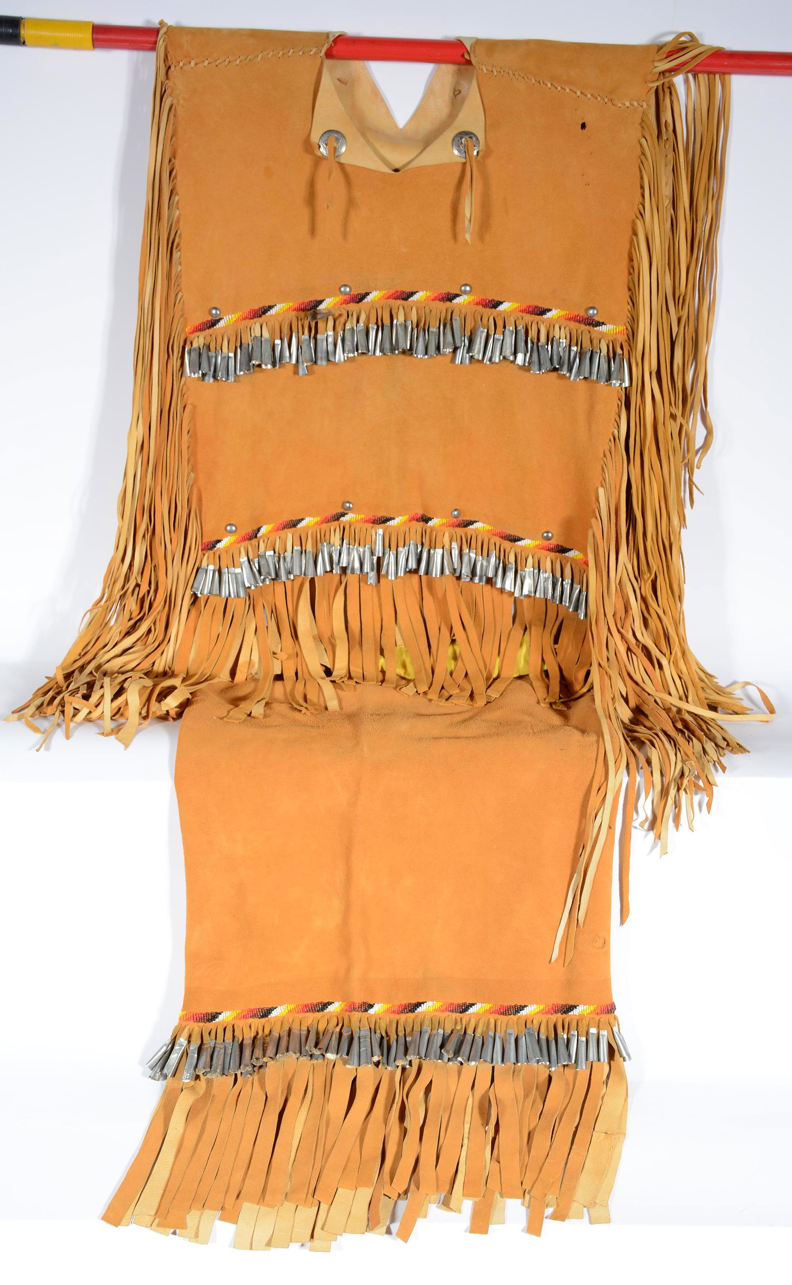 Native American Woman's Leather Dance Outfit.: Native American Woman's Leather Dance Outfit. Leather, beads, fringe, tin bangles. Great condition. Skirt is 20" w x 25" h. Top is 24" w x 36" h. Est. $500-1,000. Ship: $45