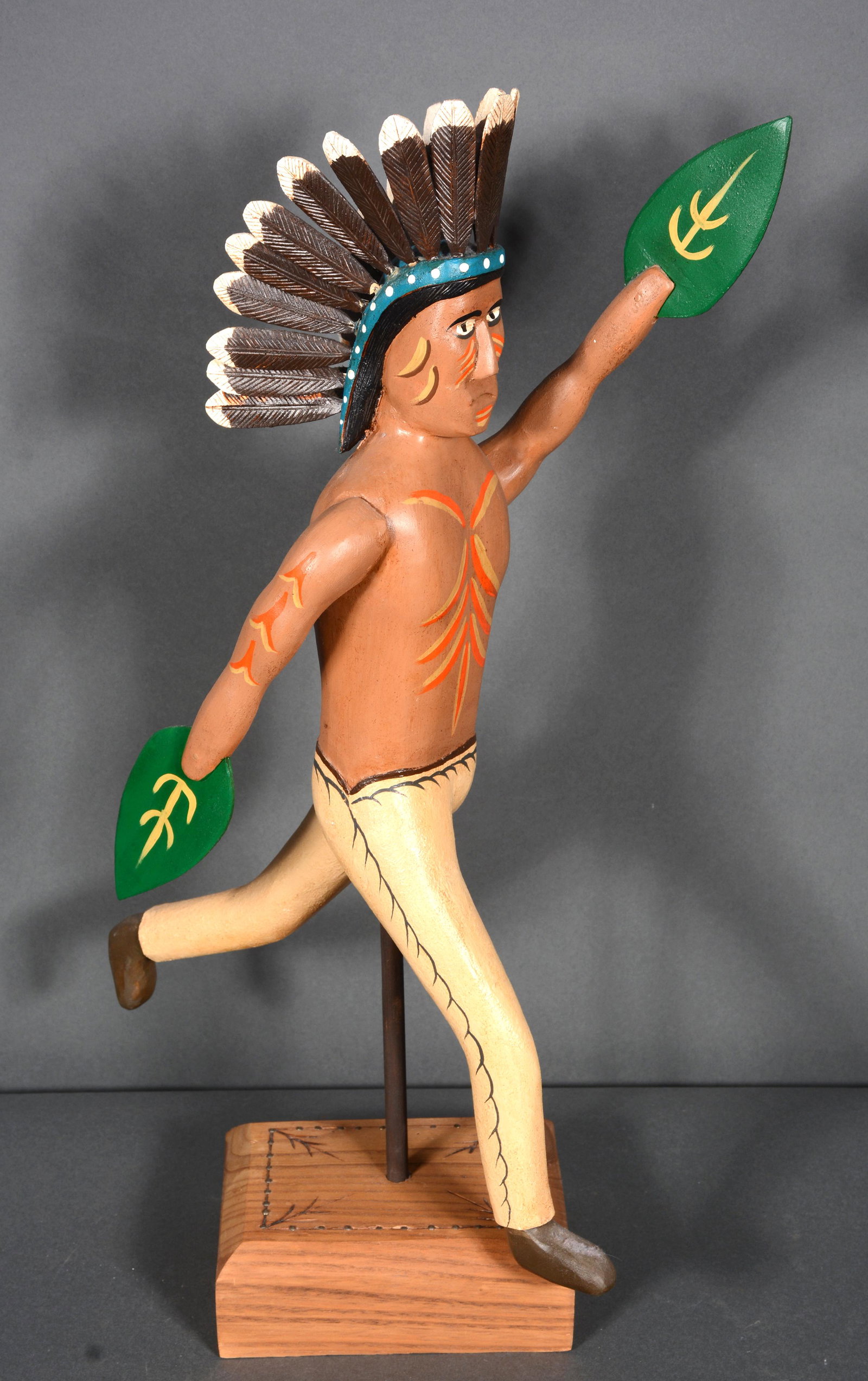 Reinert. Indian Chief Whirligig.: Reinert. Indian Chief Whirligig. 1997. Signed and dated but difficult to read. Carved and painted wood. Excellent condition. 22" h x 12" x 5". Est. $200-300. Ship: $65