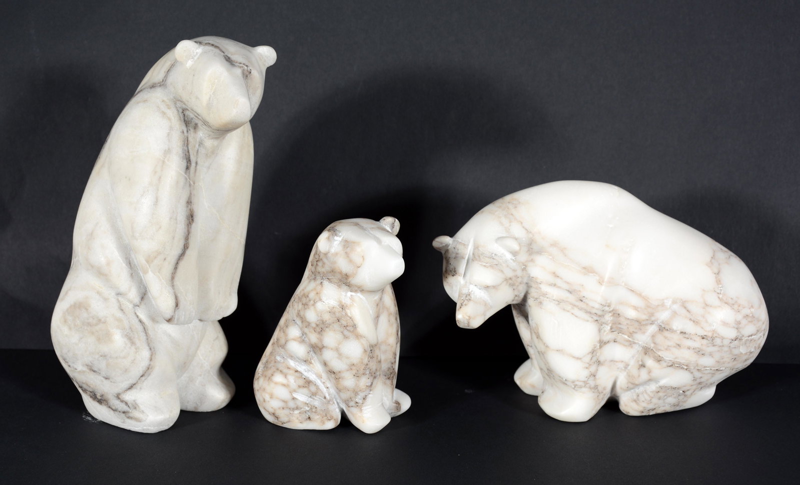 Michael Conner. 3 Alabaster Bears.: Michael Conner. 3 Alabaster Bears. 2017. Signed and dated. Carved stone. Excellent condition. Largest is 7" h. Est. $300-500. Ship: $45