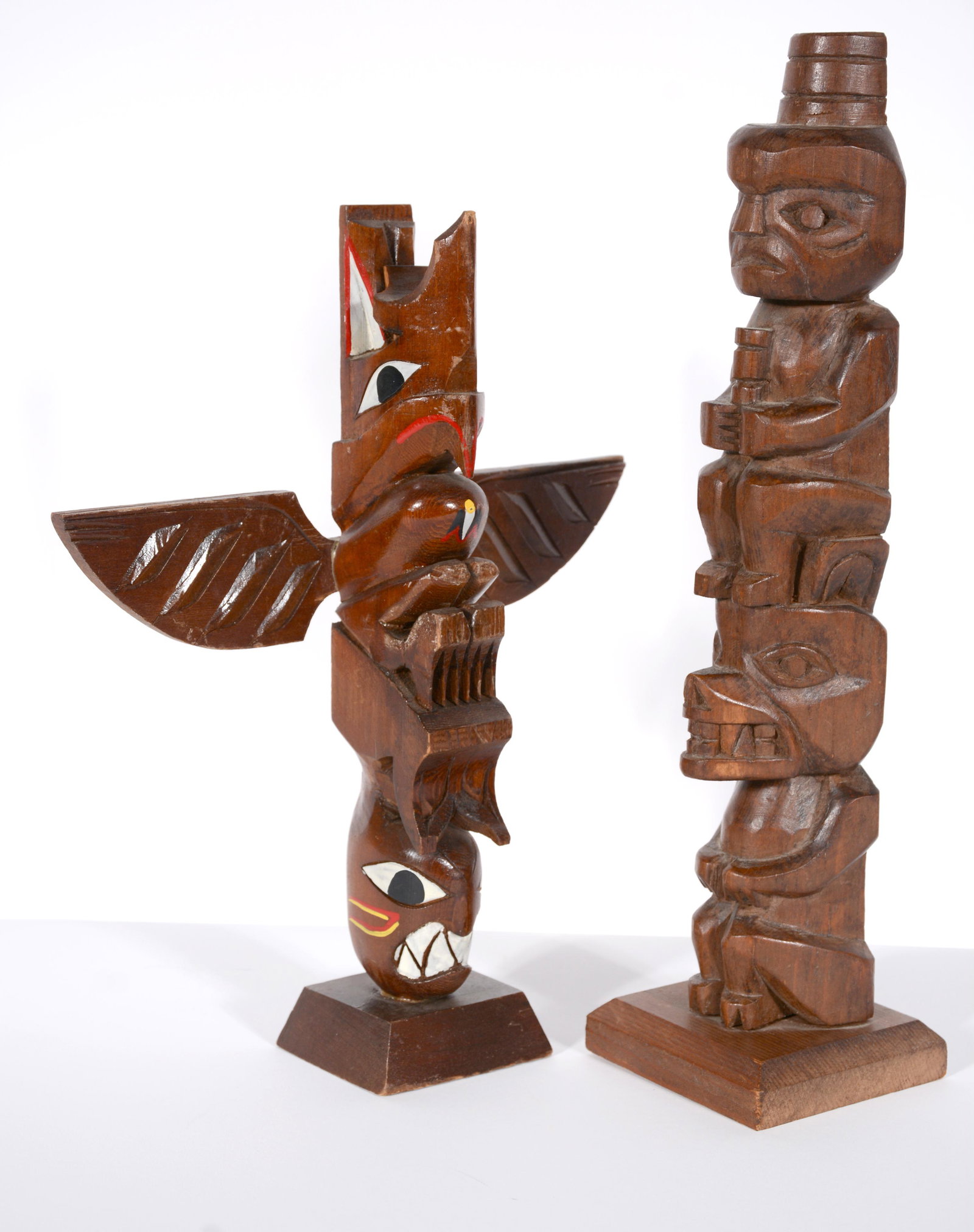 Salish and Tlingit Tribes. Model Totem Poles.: Salish and Tlingit Tribes. Model Totem Poles. 20th c. Signed, Vancouver BC - Thunderbird Killer Whale. Hand carved polychrome wood. Tallest is 11" h. Painted totem with wings has some repairs and chip