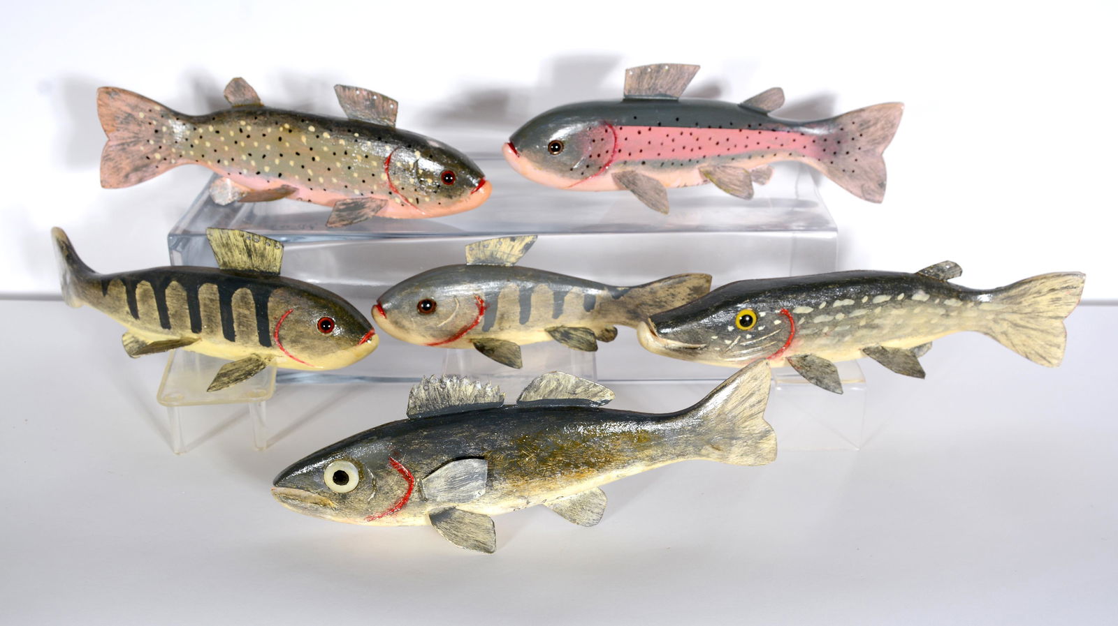 George Aho. Six Fish Decoys.: George Aho. Six Fish Decoys. Signed. Carved and painted wood with tin fins and weighted bottoms. All in good condition. Average size is 8" long. Est. $200-300. Ship: $45