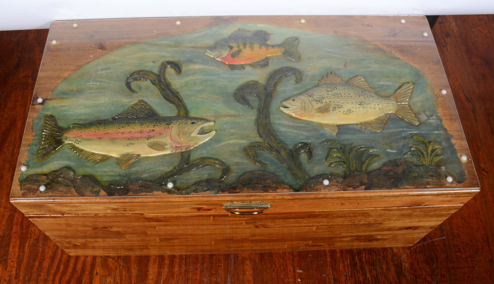 Jan. Wooden Chest Decorated with Fish Scene On Top.: Jan. Wooden Chest Decorated with Fish Scene On Top. Signed. Carved and painted lid. Great condition. 17" h x 36" w x 18" d. Est. $200-300. Ship: $250