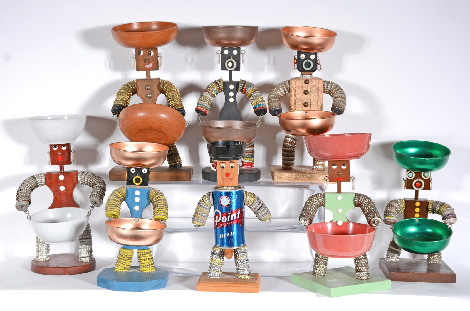 7 Bottlecap Ashtray Figures & 1 Erotic Figure.: 7 Bottlecap Ashtray Figures & 1 Erotic Figure. c. 1970's. Not signed. Mixed media. All in great condition. Average size is 14" h. Est. $100-200. Ship: $85