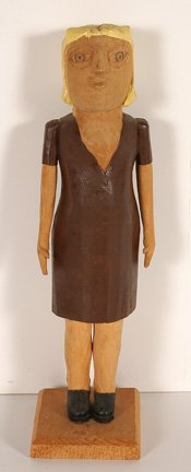 Edgar Tolson. Blond In a Brown Dress.: Edgar Tolson (1904-1984). Carved and painted wood. 14" x 3" x 4". Excellent condition. Provenance: ex. William Peltier Collection. Est. $1,000-2,000. Ship: $35