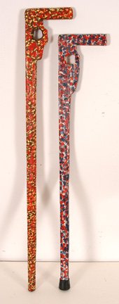 Carl McKenzie. Pair of Rifle Canes.: Paint on carved wood with rubber stopper. Signed. 36"long each. Excellent condition. Provenance: The Wenstrup Collection. Est. $100-200. Ship: $35