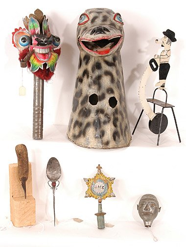 South & Central American Box Lot.: Assorted items from South and Central America including a painted metal balance toy, a religious icon and a giraffe mask from La Paz, Bolivia, c. 1975. Made of tin, 16" long. Provenance: The American 