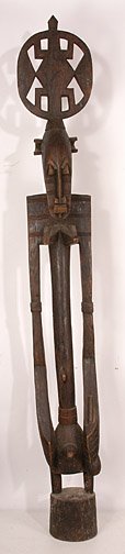 African Totem.: Carved wood. 78" h x 6" x 9.5". Very tall! Est. $200-400. Ship: $175