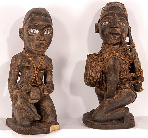 Congo Power & Maternity Figures.: Kongo Tribe, Republic of Congo. Carved wood and other natural materials. 23" x 10" each. Est. $200-300. Ship: $45