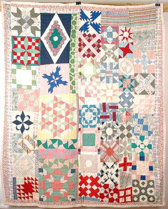 Heavy Weight Sampler Style Quilt.: Hand-stitched. Good condition. Minimal staining. 67" x 85". Est. $400-700. Ship: $25