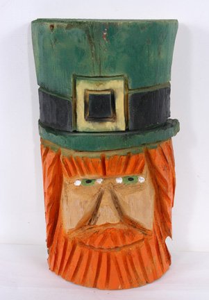 Chainsaw Art Leprechaun.: Cut and painted wood. 8.5" x 16.5" h. Est. $10-20. Ship: $35