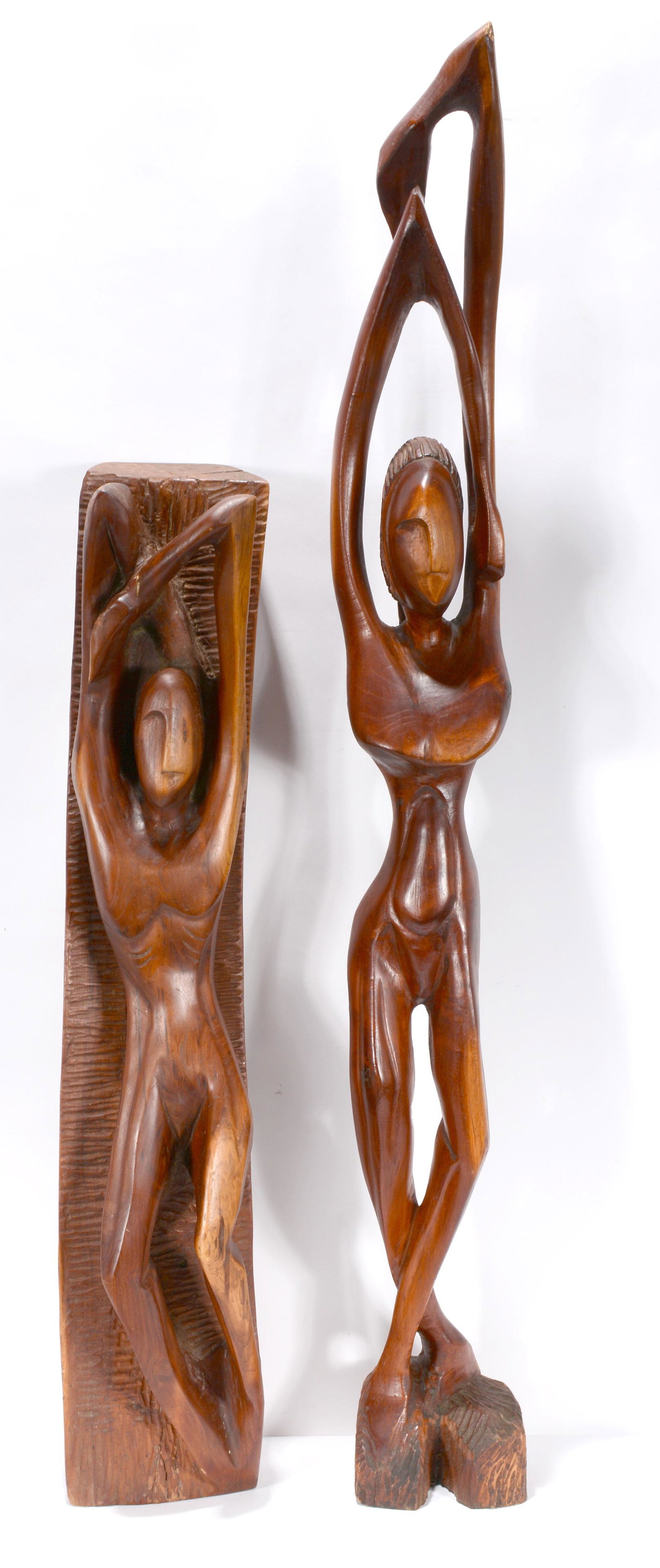 John W. Hall. Pair Of Nude Women.: John W. Hall Savannah, GA, 20th C. Pair Of Nude Women. Signed. Not dated. Carved natural wood. Some wear, otherwise great condition. Tallest is 49” x 6”. Est. $200-400. Ship: $125