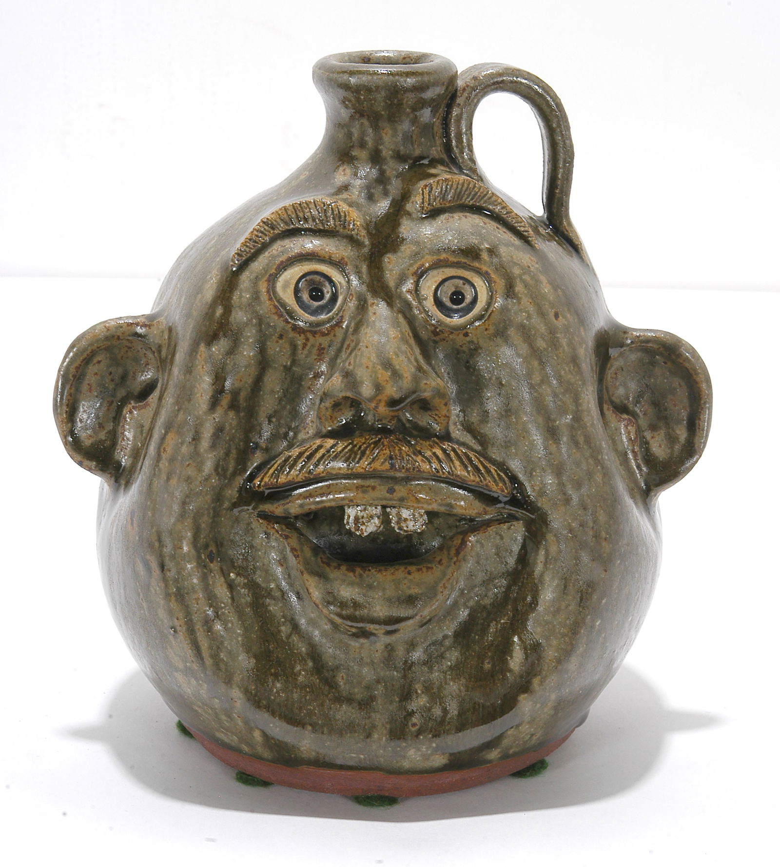 Michael & Melvin Crocker. Small Tear Drop Face Jug. (1 of 1)