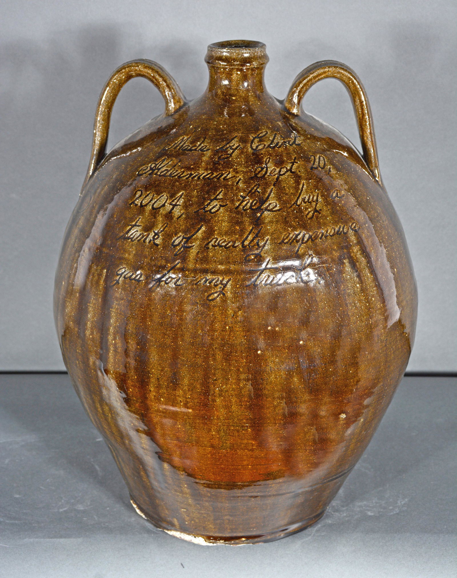 Clint Alderman. 5 Gallon Oval Bee Hive Jug. (1 of 2)