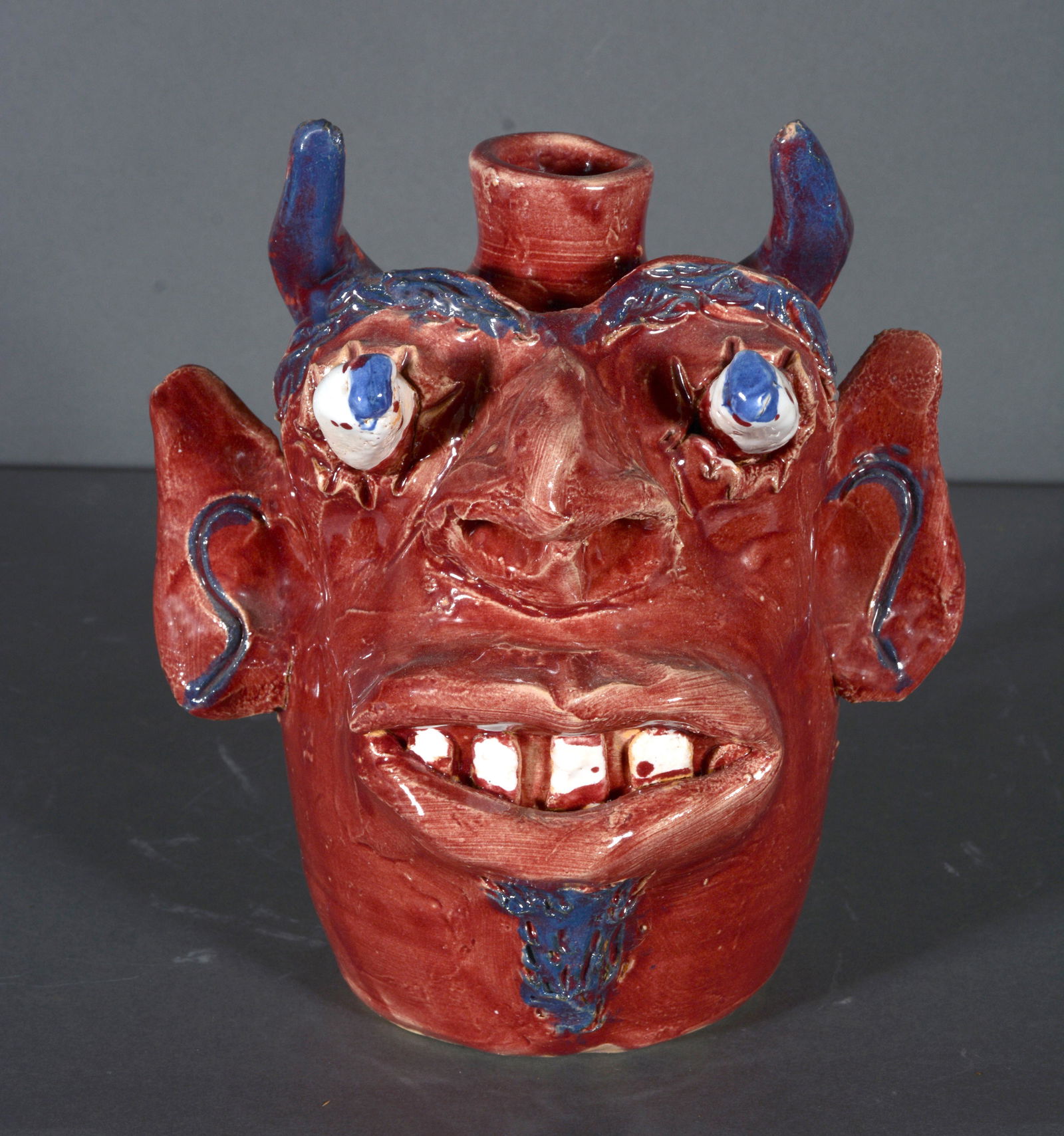 Jerry Brown. Small Red Devil Face Jug. (1 of 4)