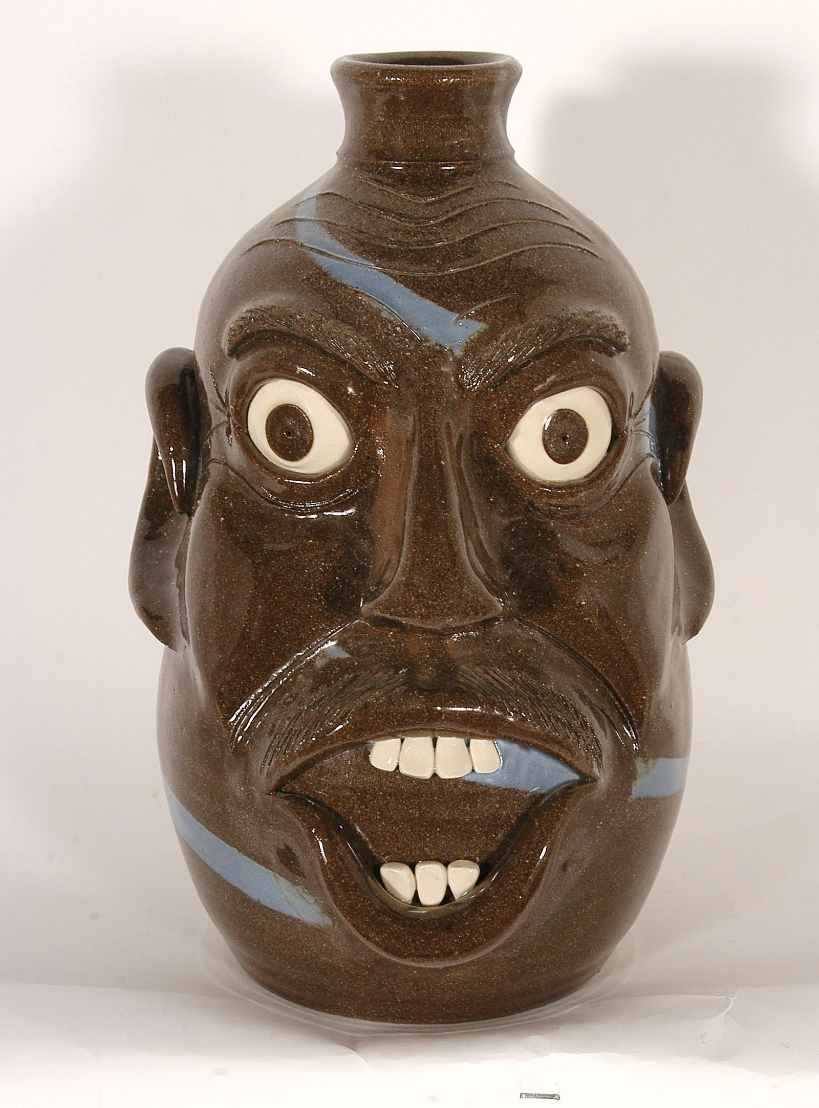 Michael Purdue. Face Jug With Blue Swirl. (1 of 1)