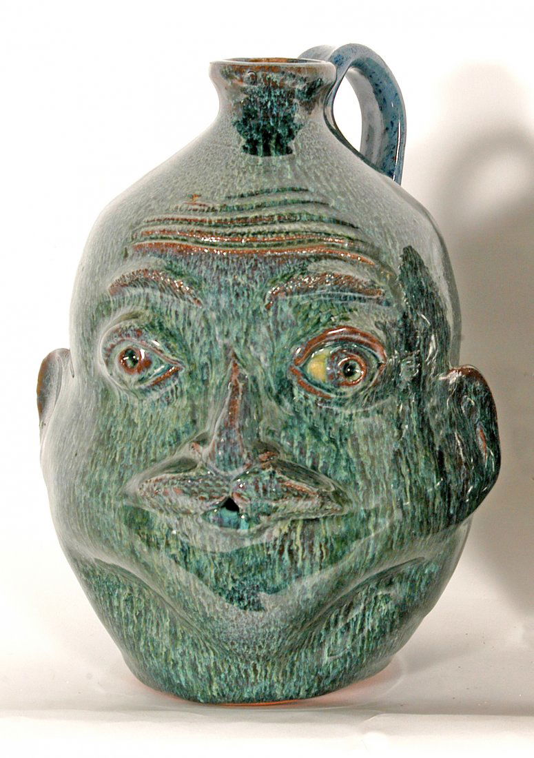 Charlie West.  Blue Green Face Jug. (1 of 2)