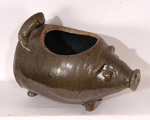 Norman Smith (attributed). Pig Planter.: Pottery Pig Planter.Albany slip glaze. Not signed. 9.5"long x 8"h. Est. $100-200. Ship: $35