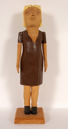 Edgar Tolson. Carved Figure of Blond Woman.: Blond In a Brown Dress.Carved and painted wood. 14"h x 3" x 4". Excellent condition. Ex. William Peltier Collection. Est. $1,000-2,000. Ship: $35