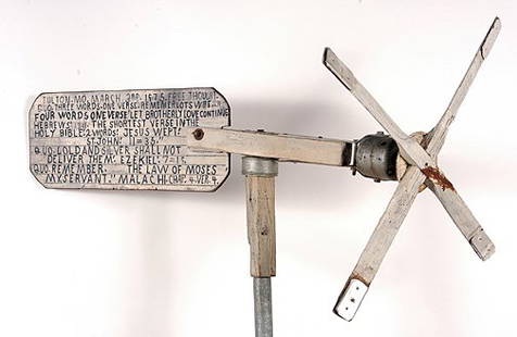 Jesse Howard. Biblical Verse Whirligig.: Biblical Verse Whirligig.Wood construction with metal, tin, gig tail has hand-written Bible verse on both sides. Sides are dated, March 4, 1976 and March 3, 1975. Signed on both sides. Early repair on
