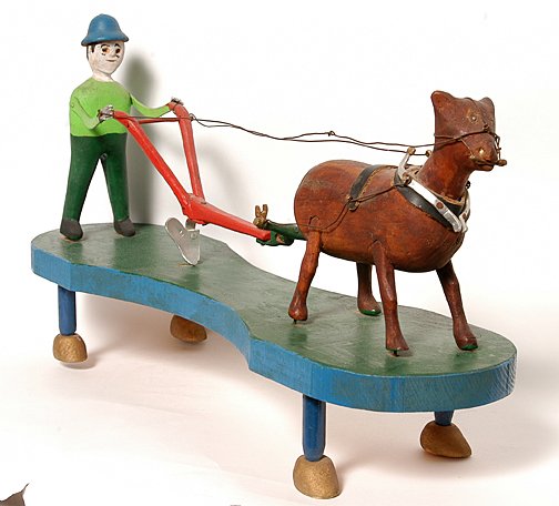 Carlton Garrett. Carved Wooden Plow Scene.: Plow Scene.Carved wood, paint and mixed media. Signed on top and bottom. 17.5" long x 9.5" h x 5"w. Excellent condition. Est. $2,000-2,500. Ship: $45