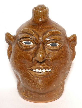 Lanier Meaders Face Jug.: Experimental matte glaze underfired. Unique mistake. Signed and dated, 1981. Rare for Lanier to date his work. 10"h. Est.: $1,000-2,000. Ship: $45
