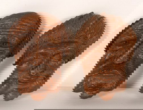 Clarence Stringfield Aunt Jeannie & Uncle Garrett.: Pair of carved wood faces. Stained and varnished. Excellent condition. Taller is 11" x 6". Est. $500-800. Ship: $45