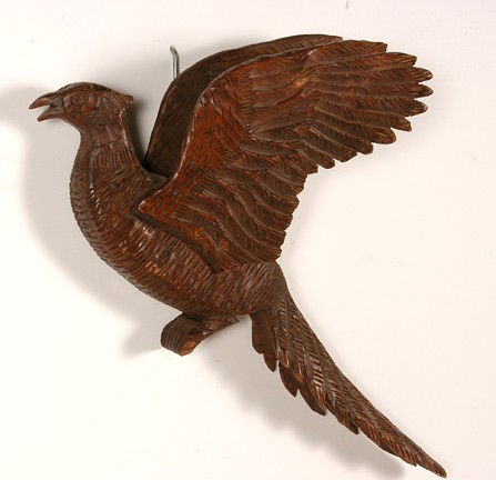 Clarence Stringfield Pheasant.: Carved and varnished wood. Small hole in wing, otherwise excellent condtion. 16" x 10" x 3". Est. $300-500. Ship: $35