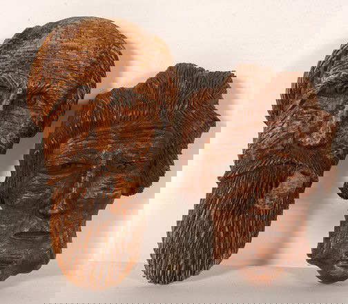 Clarence Stringfield Texas Ruby & Uncle Ned.: Pair of carved wooden faces. Stained and varnished. Excellent condition. 9" x 6" each. Est. $500-800. Ship: $45