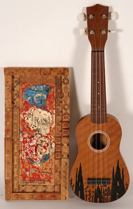 Howard Finster Scrap Work & Decorated Ulkalalee.: Scrap painting created from mixed media paint and and wood-burned frame. #2,123, dated 1981. The instrument is signed and dated, 1992. Excellent condition. 15" x 7". Est. $1,000-2,000. Ship: $65