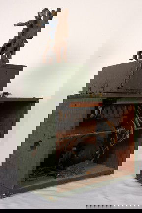 Mechanical Toy Bucking Bronco.: Carved and painted boy and horse. Mechanics are housed in painted old wooden shipping crate. May need to be re-wired. Excellent physical condition. Provenance: Howard Campbell. 23" x 14" x 8". Est. $2